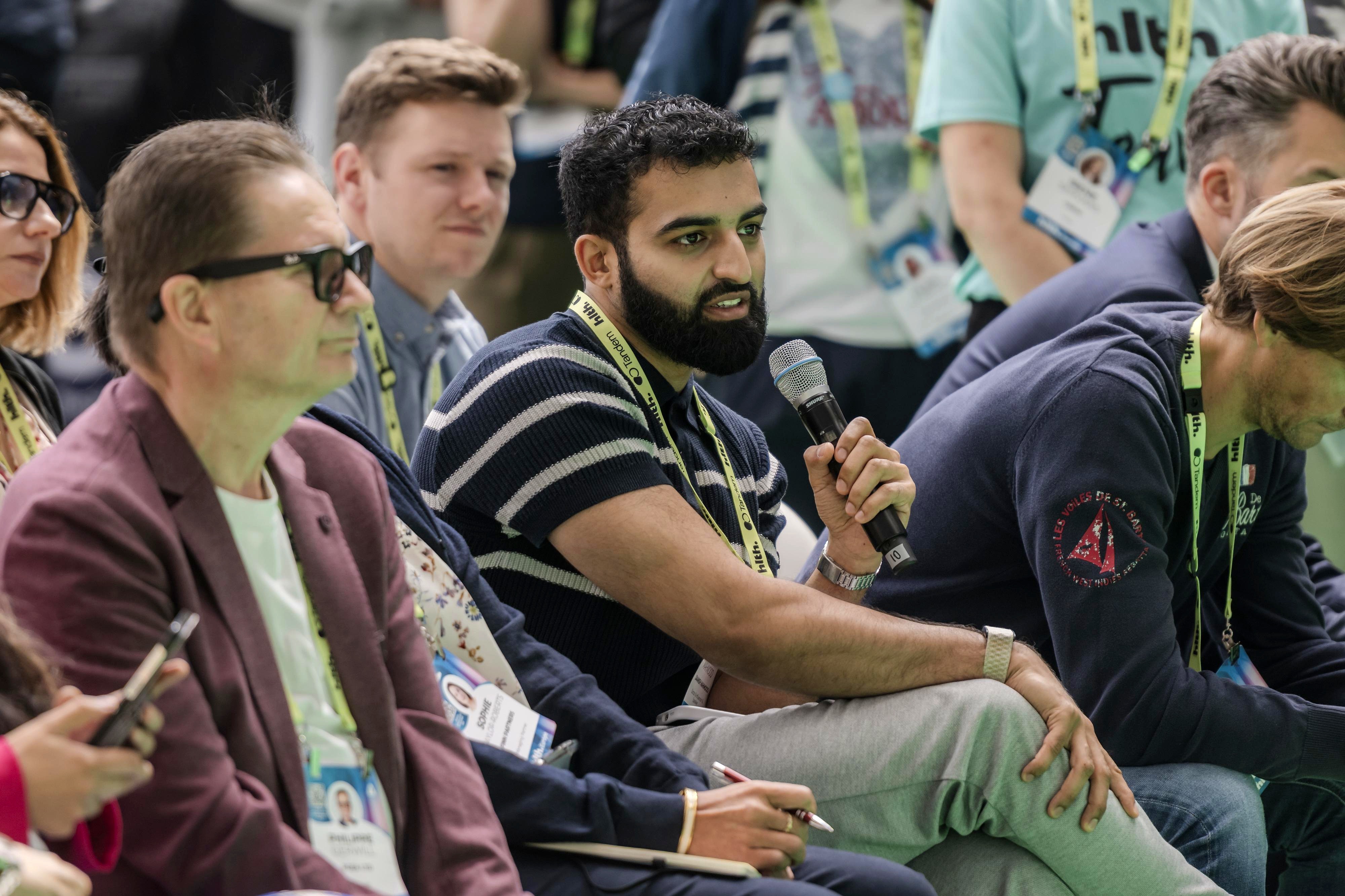 Dr Daanish answering questions from an audience